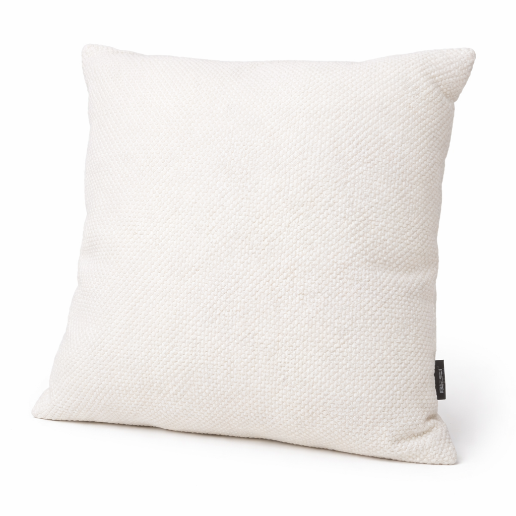 Textured white pillow on a white background